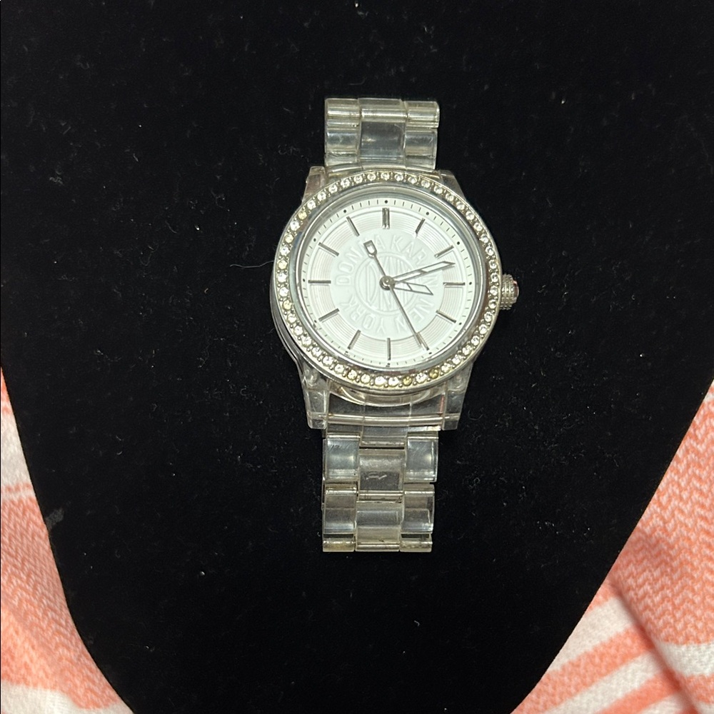 DKNY NY8017 with a clear acrylic band and crystal accents loved needs battery